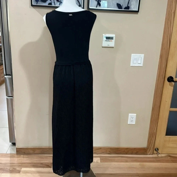 Calvin Klein
Plus Size Scoop Neck Sleeveless Smocked Knit Jersey Maxi Dress - Picture 5 of 13